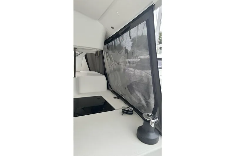  Yacht Photos Pics Interior view of 2019 Fountaine Pajot Helia 44 Evolution yacht with shaded window.