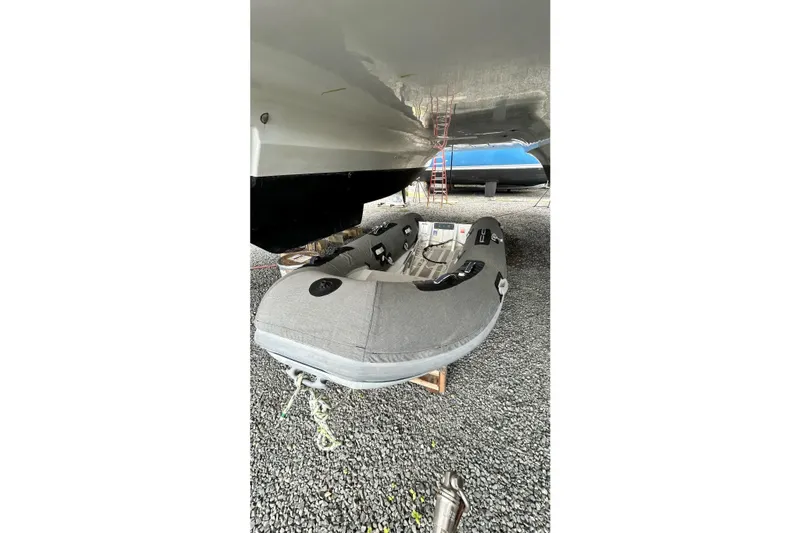  Yacht Photos Pics 2019 Fountaine Pajot Helia 44 Evolution catamaran with inflatable dinghy underneath.