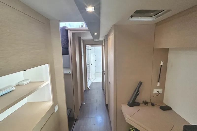  Yacht Photos Pics Interior of 2019 Fountaine Pajot Helia 44 Evolution catamaran, featuring modern design and wood finishes.