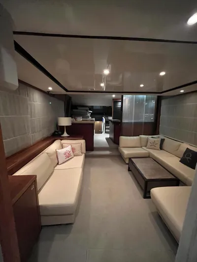  Yacht Photos Pics Luxurious interior of a 2011 Princess 64 yacht with elegant seating and modern decor.