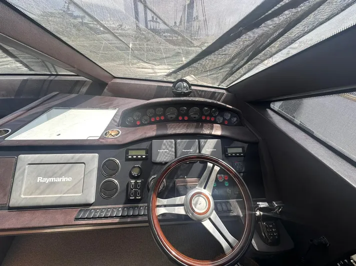  Yacht Photos Pics Helm of 2011 Princess 64 yacht with Raymarine navigation system.