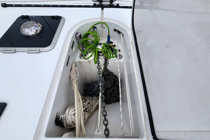 Cinnamon Yacht Photos Pics Anchor locker of 2019 Antares 44GT yacht with ropes and chains.