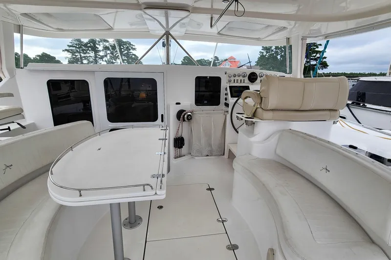 Cinnamon Yacht Photos Pics Luxurious 2019 Antares 44GT yacht cockpit with plush seating and modern helm.