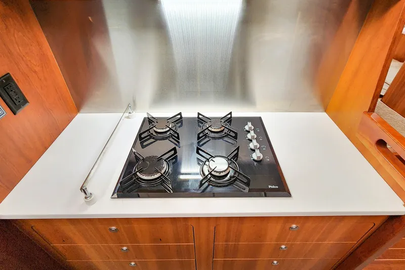Cinnamon Yacht Photos Pics Modern kitchen with a sleek Philco gas stove in an Antares 44GT yacht, 2019 model.