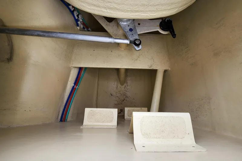 Cinnamon Yacht Photos Pics Interior view of 2019 Antares 44GT boat hull with visible piping and structural components.