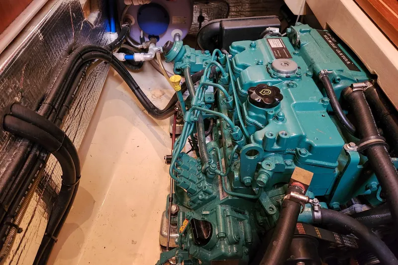 Cinnamon Yacht Photos Pics Engine compartment of a 2019 Antares 44GT, showcasing detailed mechanical components.