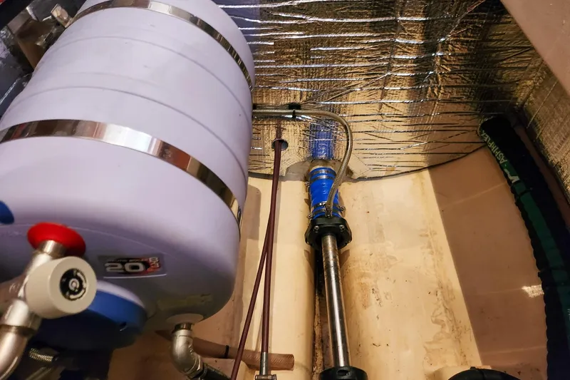 Cinnamon Yacht Photos Pics Engine compartment of 2019 Antares 44GT with insulated pipes and water tank.