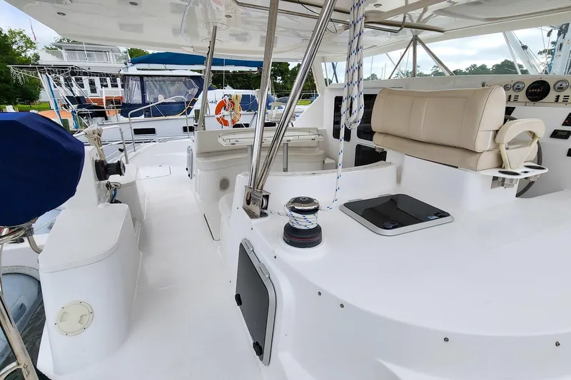 Cinnamon Yacht Photos Pics Spacious deck of 2019 Antares 44GT yacht with seating and navigation equipment.