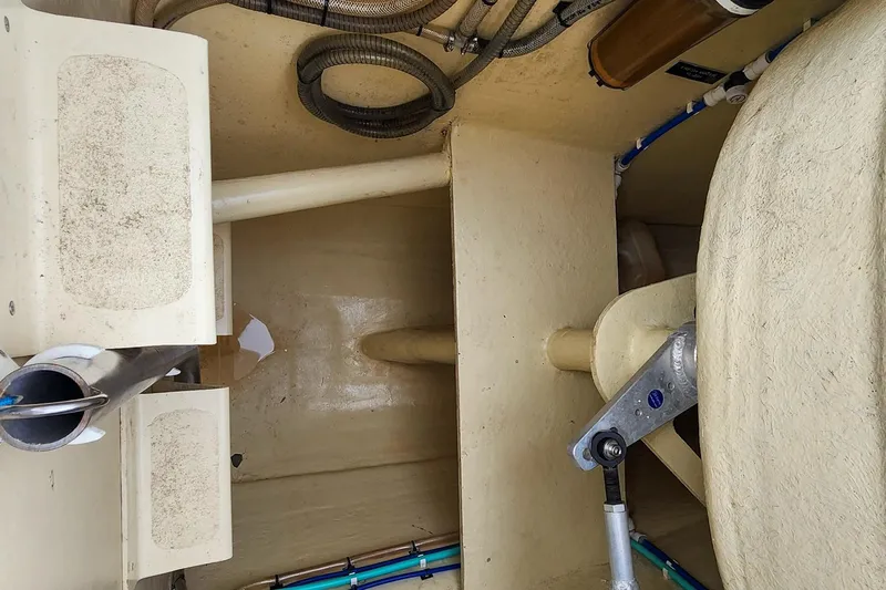 Cinnamon Yacht Photos Pics Interior view of 2019 Antares 44GT boat showing mechanical components and piping.