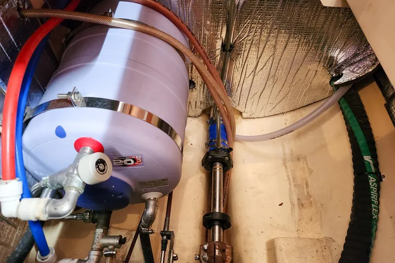 Cinnamon Yacht Photos Pics Engine room of 2019 Antares 44GT with water heater and insulated pipes.