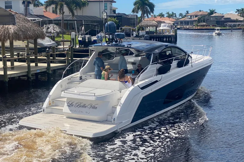  Yacht Photos Pics Azimut Atlantis 45 yacht cruising in a scenic waterfront area, 2021 model.