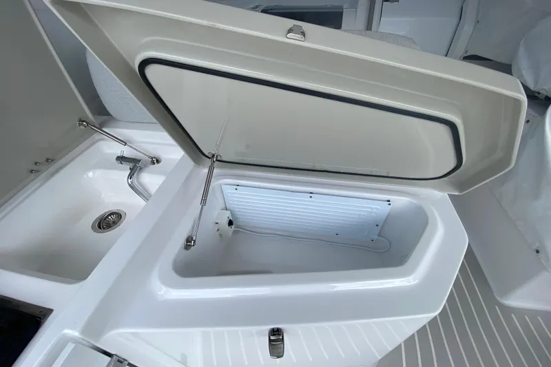  Yacht Photos Pics Open storage compartment and sink on 2021 Azimut Atlantis 45 yacht.