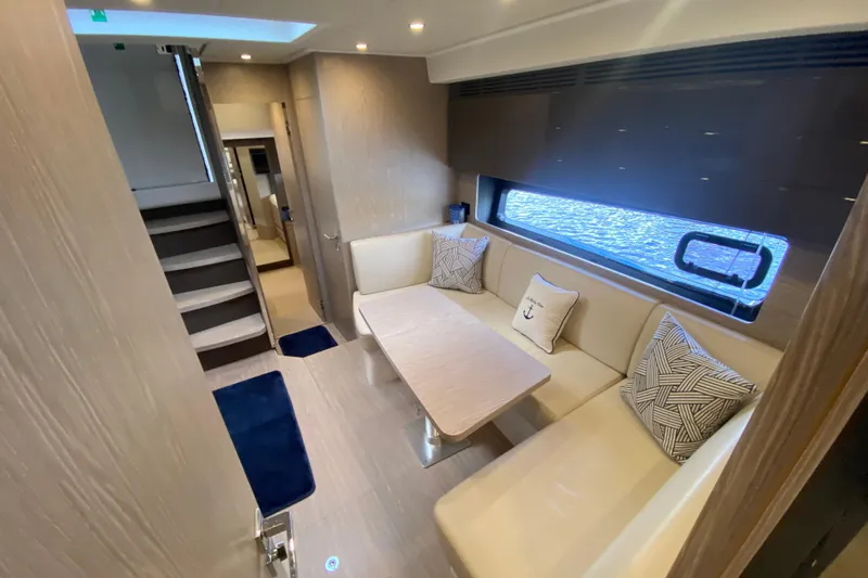  Yacht Photos Pics Luxurious interior of 2021 Azimut Atlantis 45 yacht with elegant seating and nautical decor.