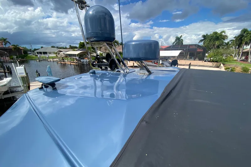  Yacht Photos Pics Azimut Atlantis 45 yacht roof with radar domes, docked by waterfront homes, 2021 model.