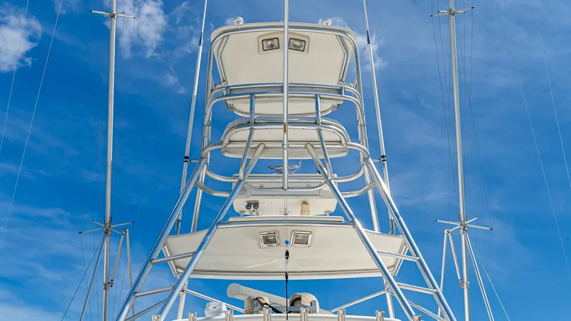  Yacht Photos Pics Tower of 2008 Cabo 38 Express boat against clear blue sky.
