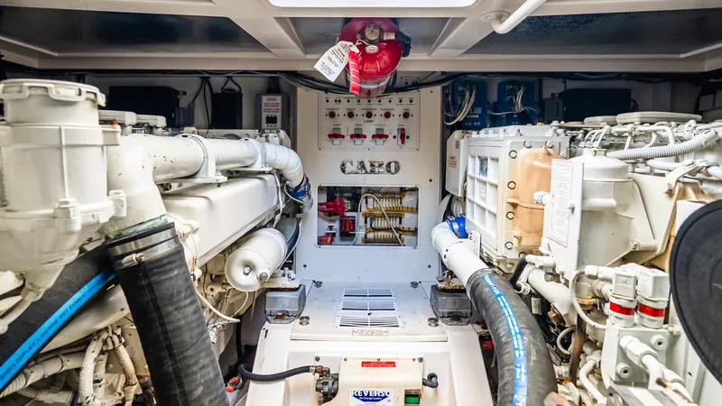  Yacht Photos Pics Engine room of a 2008 Cabo 38 Express boat, showcasing machinery and equipment.