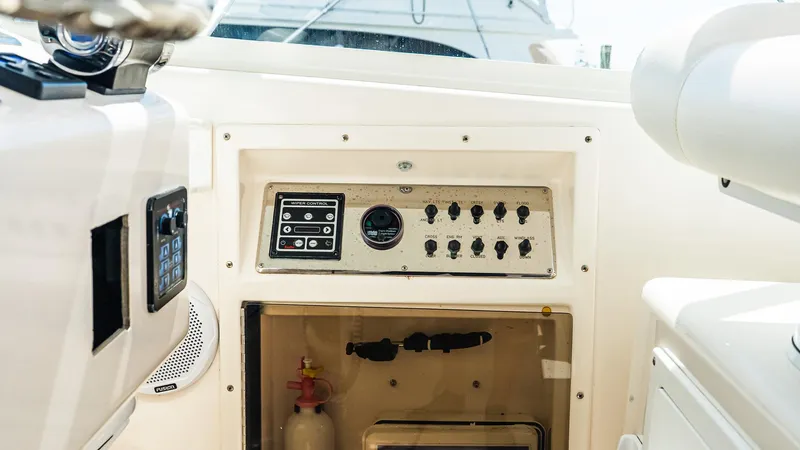  Yacht Photos Pics Control panel of a 2008 Cabo 38 Express boat interior.