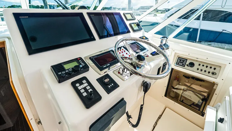  Yacht Photos Pics Helm of 2008 Cabo 38 Express boat with advanced navigation equipment and controls.