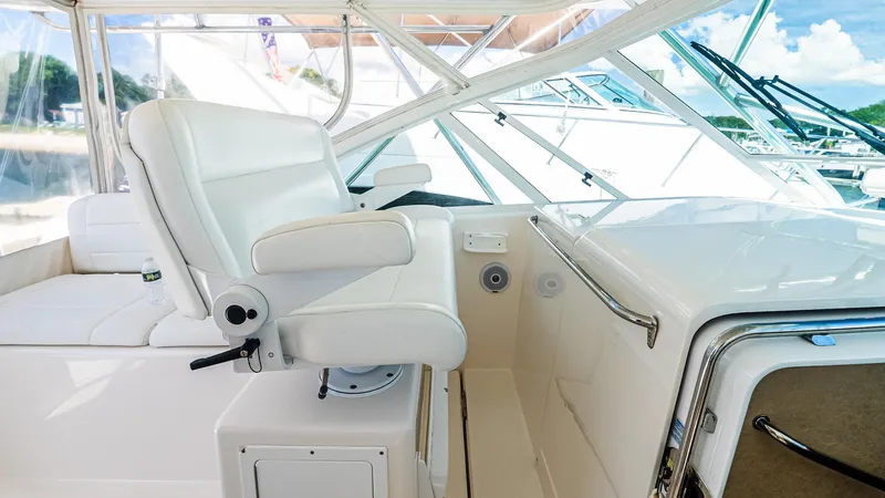  Yacht Photos Pics 2008 Cabo 38 Express yacht interior with white captain's chair and sleek design.