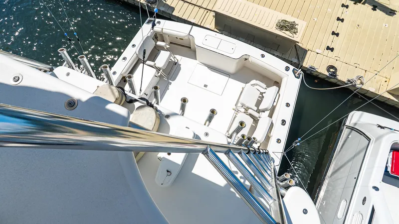  Yacht Photos Pics 2008 Cabo 38 Express boat docked, view of fishing cockpit and ladder.