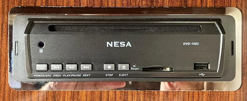 Sapphire Yacht Photos Pics NESA DVD-1002 player on 2014 Regal 38 Express yacht, featuring control buttons and USB port.