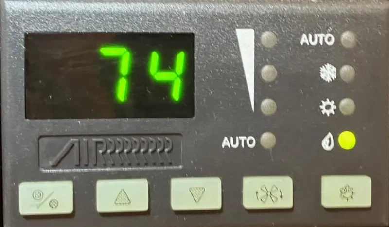 Sapphire Yacht Photos Pics Digital control panel displaying 74 degrees on a 2014 Regal 38 Express.