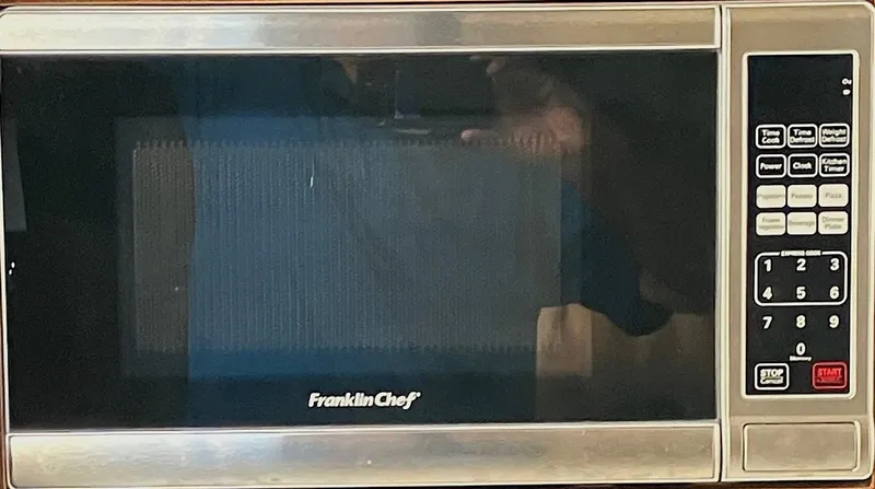Sapphire Yacht Photos Pics Stainless steel Franklin Chef microwave with digital keypad and display.