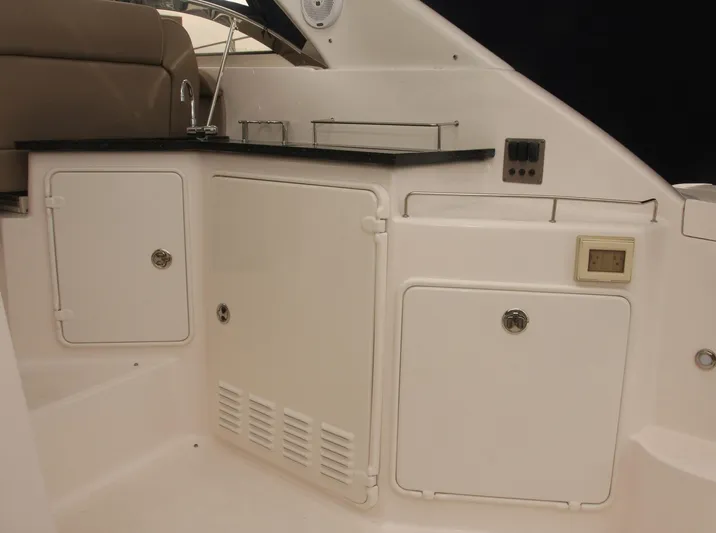Sapphire Yacht Photos Pics 2014 Regal 38 Express yacht interior with cabinets and sink.