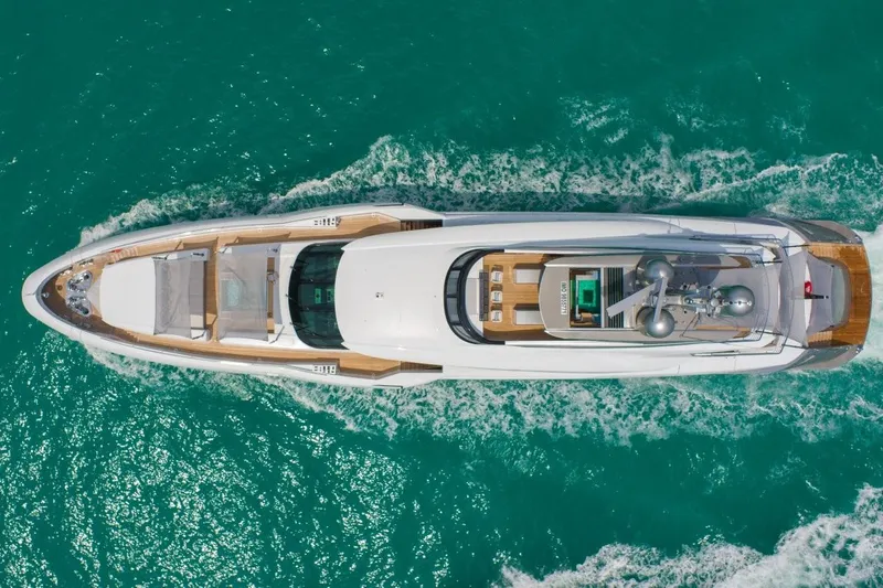 Eiv Yacht Photos Pics Aerial view of 2020 Rossinavi Custom yacht cruising in turquoise waters.