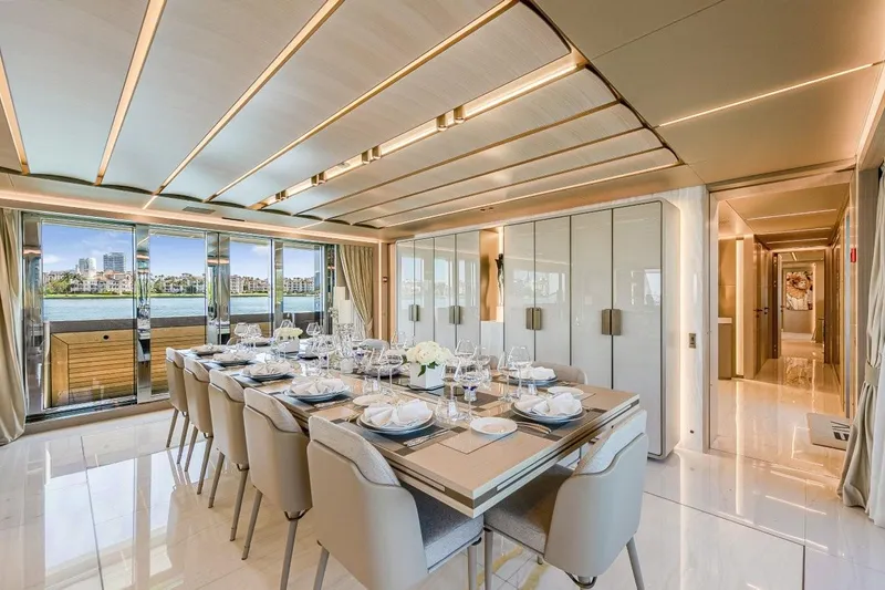 Eiv Yacht Photos Pics Luxurious dining area on 2020 Rossinavi Custom yacht with elegant table setting and waterfront view.