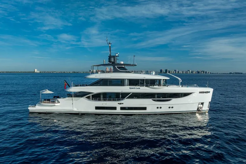 King's Lair Yacht Photos Pics Luxury Benetti 34M OASIS yacht cruising on open water, 2023 model.