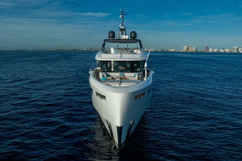 King's Lair Yacht Photos Pics Luxury Benetti 34M OASIS yacht cruising on open water, 2023 model.