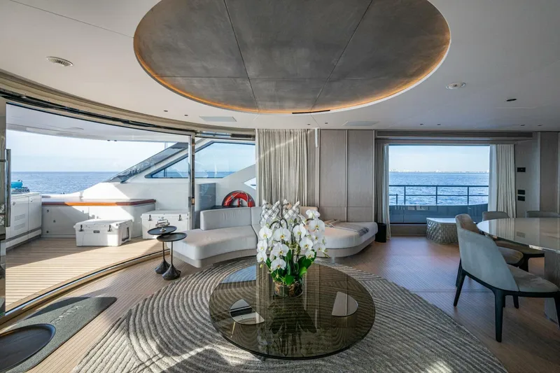 King's Lair Yacht Photos Pics Luxurious interior of 2023 Benetti 34M OASIS yacht with ocean view and elegant decor.
