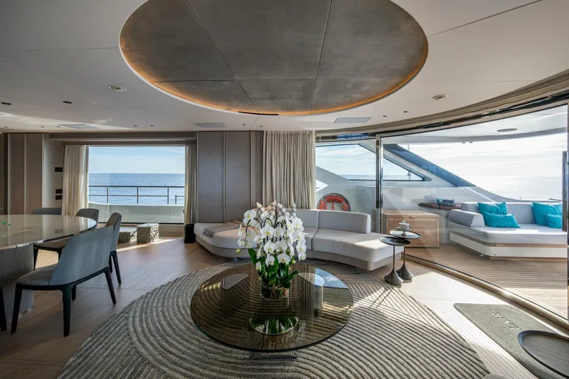 King's Lair Yacht Photos Pics Luxurious interior of 2023 Benetti 34M OASIS yacht with ocean view and elegant decor.