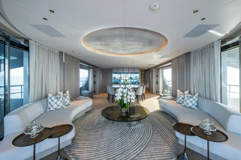 King's Lair Yacht Photos Pics Luxurious interior of 2023 Benetti 34M OASIS yacht with elegant seating and modern decor.