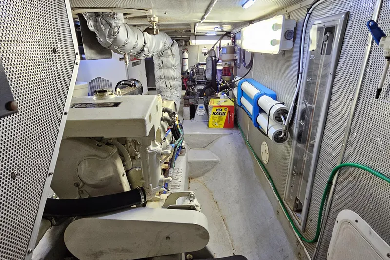Good Job Yacht Photos Pics Engine room of a 2002 Nordhavn Trawler, featuring machinery and equipment.