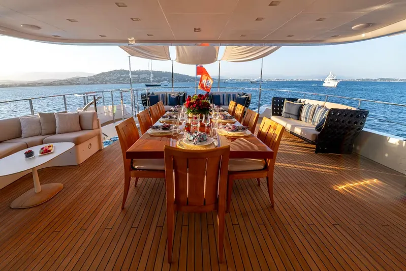 Lady H Yacht Photos Pics Luxurious dining area on 2011 Benetti Majesty 120 yacht with ocean view.