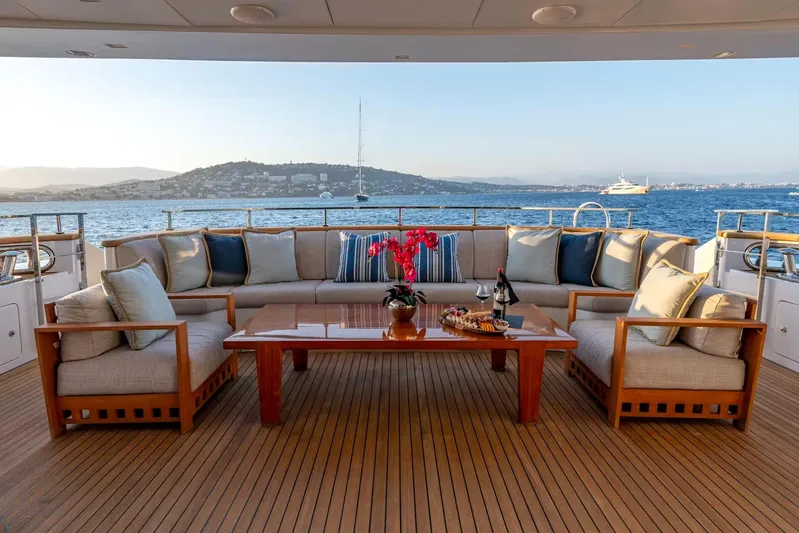 Lady H Yacht Photos Pics Luxurious deck seating on 2011 Benetti Majesty 120 yacht with ocean view.