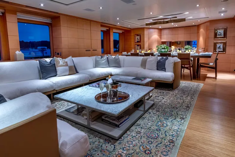 Lady H Yacht Photos Pics Luxurious interior of 2011 Benetti Majesty 120 yacht with elegant seating and dining area.