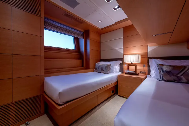Lady H Yacht Photos Pics Luxurious cabin interior of 2011 Benetti Majesty 120 yacht with twin beds and elegant decor.