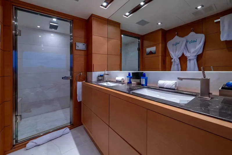 Lady H Yacht Photos Pics Luxurious bathroom on 2011 Benetti Majesty 120 yacht with dual sinks and modern shower.