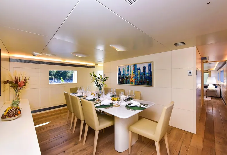  Yacht Photos Pics Luxurious dining area on a 2007 Admiral 36 yacht, featuring elegant decor and modern furnishings.