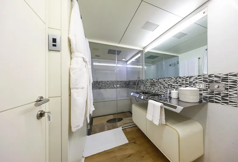  Yacht Photos Pics Luxurious yacht bathroom with modern fixtures, glass shower, and elegant design. Admiral 36, 2007 model.