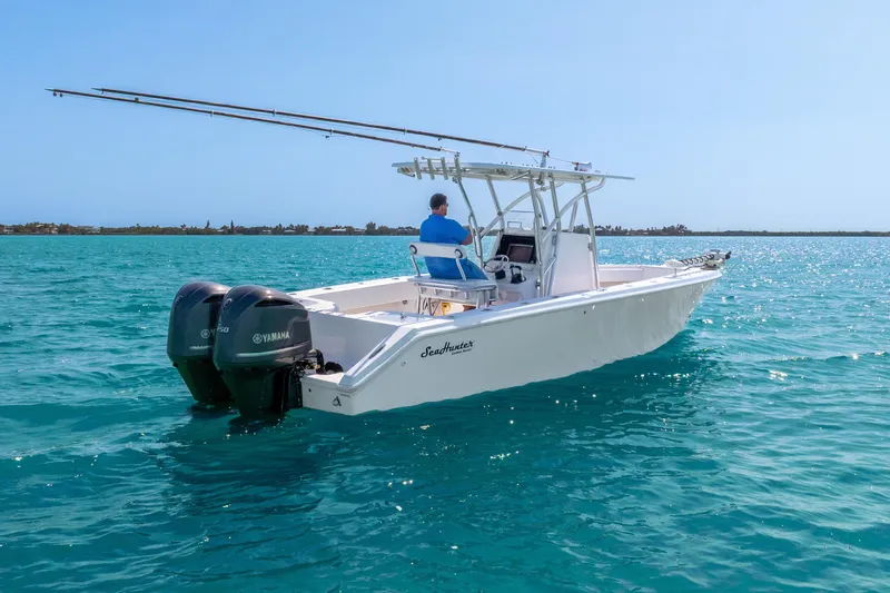  Yacht Photos Pics 2012 SeaHunter 29 boat with dual Yamaha engines on turquoise water.