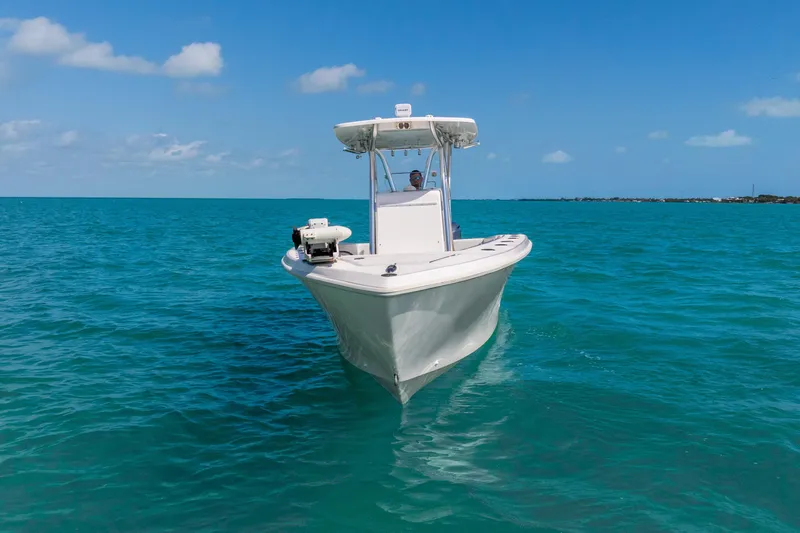  Yacht Photos Pics 2012 SeaHunter 29 boat cruising on clear blue ocean under sunny sky.