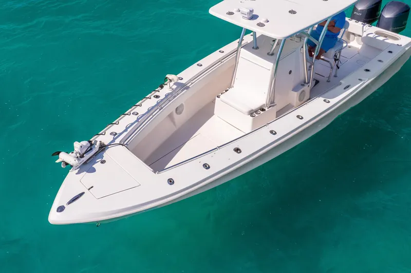  Yacht Photos Pics 2012 SeaHunter 29 boat on clear turquoise water, aerial view.