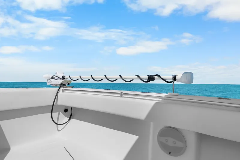  Yacht Photos Pics 2012 SeaHunter 29 boat with trolling motor, ocean view, and clear blue sky.