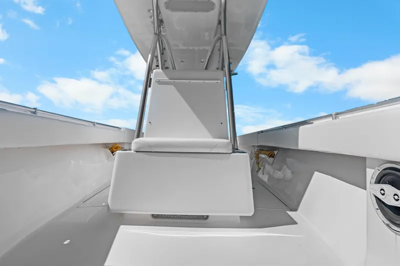  Yacht Photos Pics 2012 SeaHunter 29 boat interior with seating, under a clear blue sky.