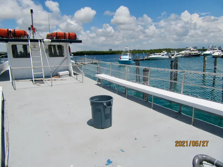 Atlantis Yacht Photos Pics Commercial drift fishing boat docked at marina, clear skies, 1986 model.