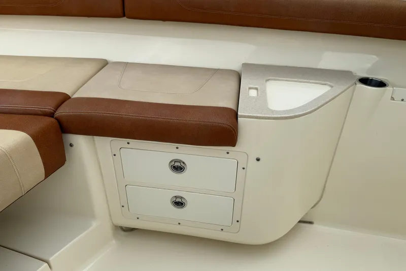 T/t B Happy Yacht Photos Pics 2019 Scout 320 LXF boat interior with cushioned seating and storage compartments.